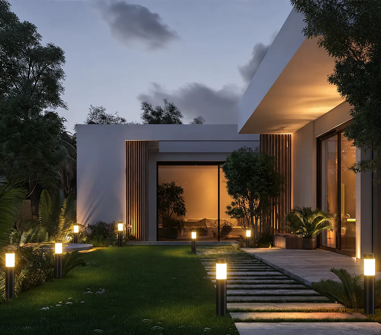 Solar bollard lights installed around a courtyard path